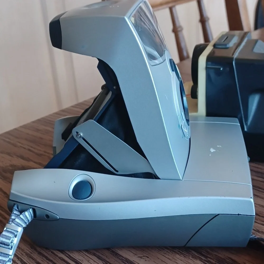 Vintage Polaroid 1200FF Spectra Instant Film Camera with strap